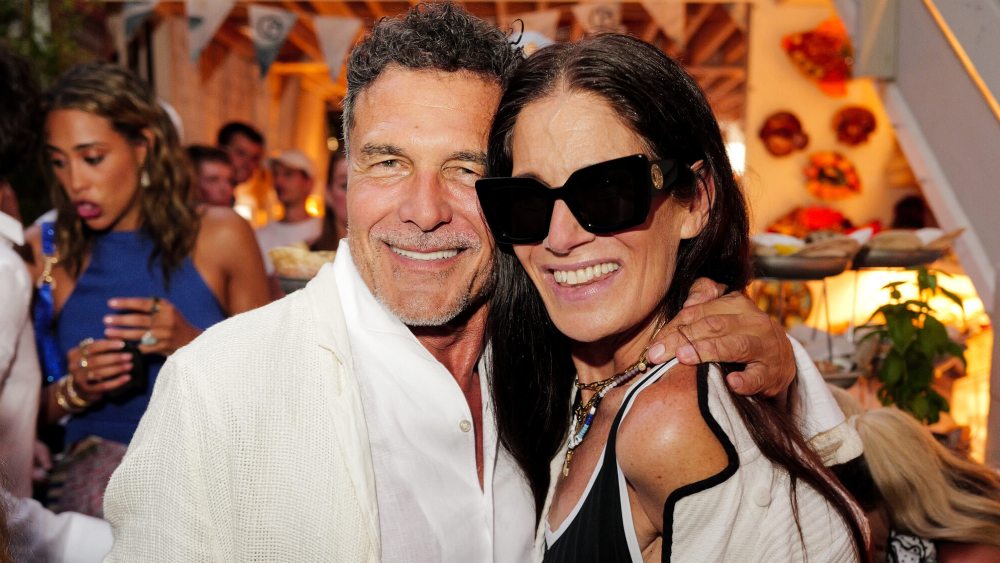 André Balazs and Elizabeth Saltzman at Giorgio Armani Mare 2025 pop-up cocktail party.