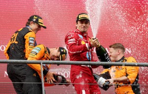 SPA, BELGIUM - JULY 27: Race winner Oscar Piastri of Australia and McLaren, Second placed Lando Norris of Great Britain and McLaren, and Third placed Charles Leclerc of Monaco and Scuderia Ferrari celebrate on the podium during the F1 Grand Prix of Belgium at Circuit de Spa-Francorchamps on July 27, 2025 in Spa, Belgium. (Photo by Ryan Pierse/Getty Images)