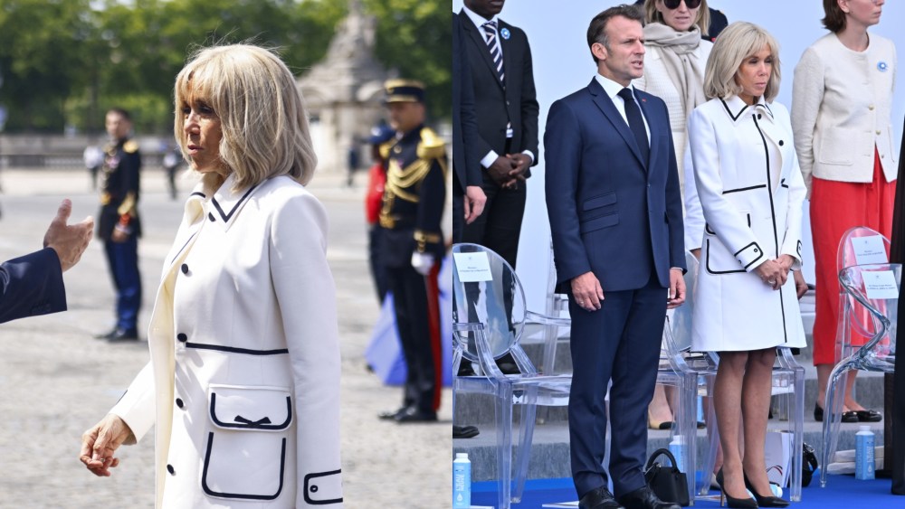 France's President Emmanuel Macron speaks with his wife Brigitte Macron as they leave the annual Bastille Day military parade on the Champs-Elysees Avenue in Paris on July 14, 2025. (Photo by Mohammed  BADRA / POOL / AFP) (Photo by MOHAMMED  BADRA/POOL/AFP via Getty Images)