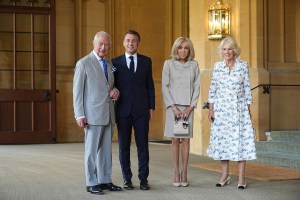 WINDSOR, ENGLAND - JULY 9: King Charles III and Queen Camilla, formally bid farewell to the President of France Emmanuel Macron and his wife Brigitte Macron at Windsor Castle, Berkshire, on day two of the French President's state visit to the UK, on July 9, 2025 in Windsor, England. President Emmanuel Macron and Mrs Brigitte Macron visit the UK in the first visit State Visit made by France in 17 years. They are staying at Windsor Castle, hosted by King Charles III and Queen Camilla. (Photo Aaron Chown - Pool/Getty Images)