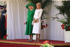 WINDSOR, ENGLAND - JULY 8: Queen Camilla and Brigitte Macron during a Ceremonial Welcome for the state visit to the UK of the President of France Emmanuel Macron and his wife Brigitte Macron at Windsor Castle on July 8, 2025 in Windsor, England. President Emmanuel Macron and Mrs Brigitte Macron visit the UK in the first visit State Visit made by France in 17 years. They are staying at Windsor Castle, hosted by King Charles III and Queen Camilla, and a banquet will be held there in their honour. The Macrons will visit Imperial College, and the President will address Parliament during his stay.  (Photo by Richard Pohle - WPA Pool/Getty Images)
