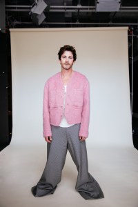 Kenzo hairy wool alpaca and mohair mix jacket over talent’s own tank top (worn throughout); Coach wool and polyester pants.