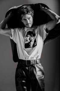 Saint Laurent by Anthony Vaccarello wool jacket and leather pants; Noah x Peter Anderson cotton tee.