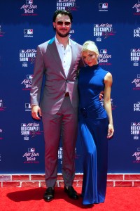 ATLANTA, GA - JULY 15: Paul Skenes #30 of the Pittsburgh Pirates and Livvy Dunne pose for a photo during the 2025 All-Star Red Carpet Show presented by Deer Park at Battery Ave on Tuesday, July 15, 2025 in Atlanta, Georgia. (Photo by Mary DeCicco/MLB Photos via Getty Images)