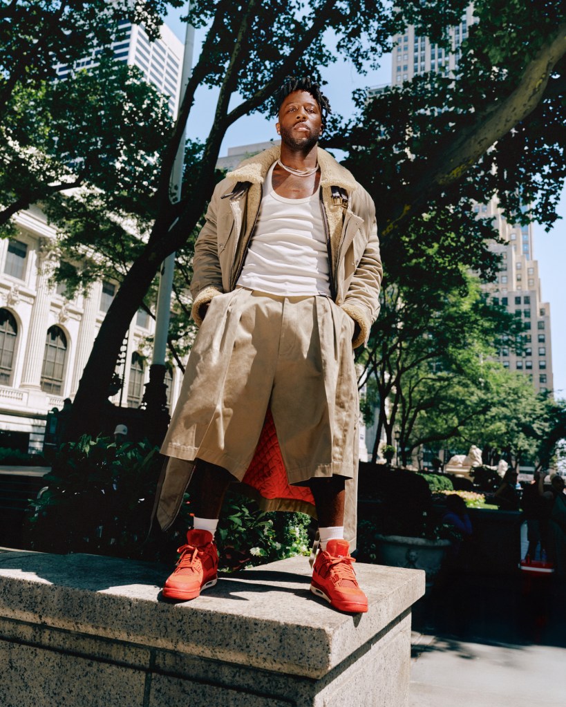 Dsquared2 cotton parka, faux fur jacket, cotton tank top and shorts; Nigel Sylvester x Air Jordan 4 Brick by Brick.