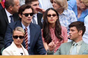 LONDON, ENGLAND - JULY 02: Actor, Louis Patridge and musician, Olivia Rodrigo are seen in the Royal Box prior to the Ladies' Singles second round match between Aryna Sabalenka and Marie Bouzkova of Czechia on day three of The Championships Wimbledon 2025 at All England Lawn Tennis and Croquet Club on July 02, 2025 in London, England. (Photo by Clive Brunskill/Getty Images)