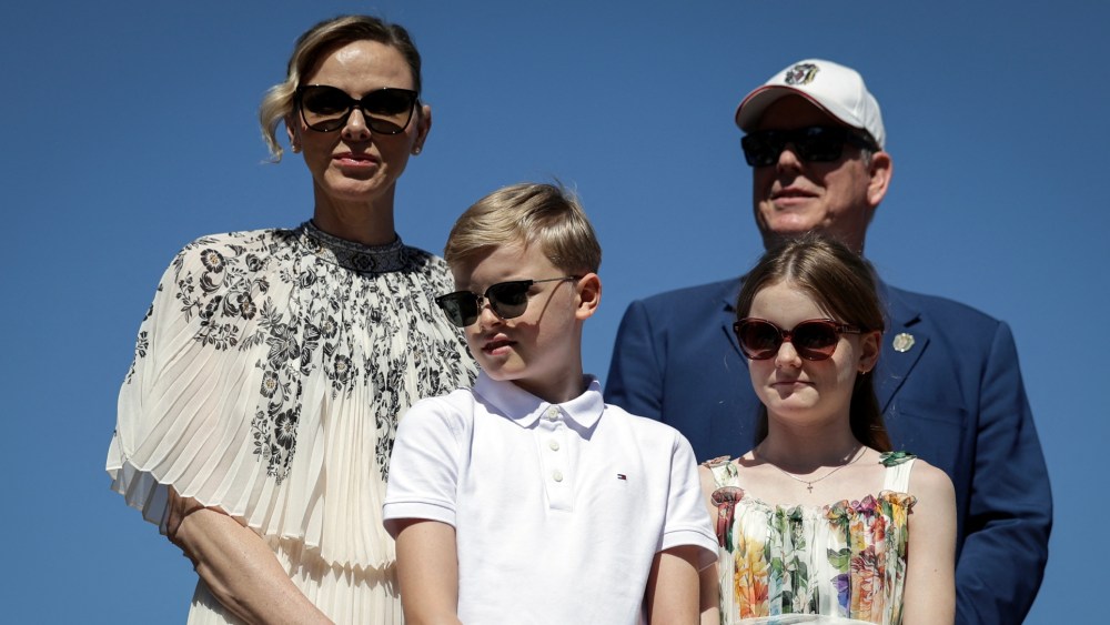 Prince Albert II of Monaco (R), his wife Princess Charlene of Monaco (L), and their children Gabriella and Jacques, look on as they arrive for a visit to Carladez, a former possession of the Principality of Monaco, in Mur-de-Barrez, southern France on July 9, 2025. (Photo by Valentine CHAPUIS / AFP) / NO TABLOIDS WEB & PRINT, NO DAILY MAIL, NO DAILY MAIL GROUP, NO VOICI, NO CLOSER (Photo by VALENTINE CHAPUIS/AFP via Getty Images)
