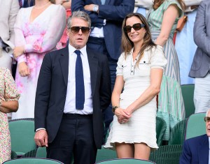 LONDON, ENGLAND - JULY 09: Hugh Grant and Anna Elisabet Eberstein attend day ten of the Wimbledon Tennis Championships at the All England Lawn Tennis and Croquet Club on July 09, 2025 in London, England. (Photo by Karwai Tang/WireImage)