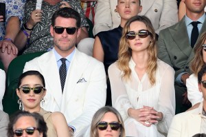 LONDON, ENGLAND - JULY 13: Liam Hemsworth and Gabriella Brooks, wearing Ralph Lauren, attends day fourteen of the Wimbledon Tennis Championships at the All England Trennis and Croquet Club at on July 13, 2025 in London, England. (Photo by Karwai Tang/Getty Images for Ralph Lauren)