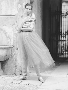 Model wearing an acid yellow silk shantung wrap top with slim matching pants and a cinnamon silk chiffon overskirt from the Romeo Gigli spring 1990 Ready-To-Wear collection 'Dancing Romeo'...Article title: 'Romeo's New Dance