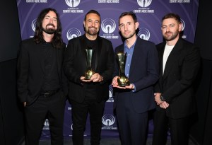 NASHVILLE, TENNESSEE - AUGUST 20: (L-R) Ian Cripps, Kevin Weaver, Brandon Davis and Joseph Khoury of "Twisters" pose with the ACM Film Award during the 18th Academy Of Country Music Honors at The Pinnacle on August 20, 2025 in Nashville, Tennessee. (Photo by Terry Wyatt/Getty Images for ACM)