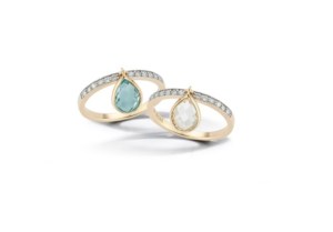 “Delicate pear-cut gemstones suspended in gold — a modern twist on timeless elegance.”