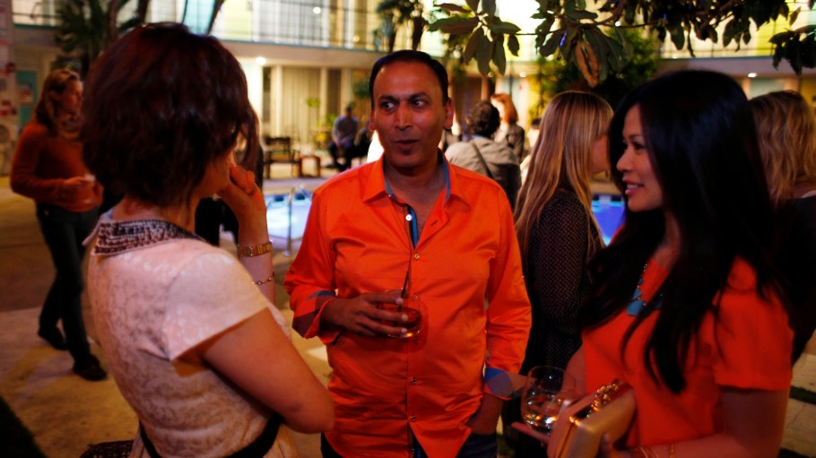 Manish Chandra (center) with Brenda Schuler (left) and Lyann Schhay (right) at a Poshmark party at the Phoenix Hotel in San Francisco, on March 18, 2014.