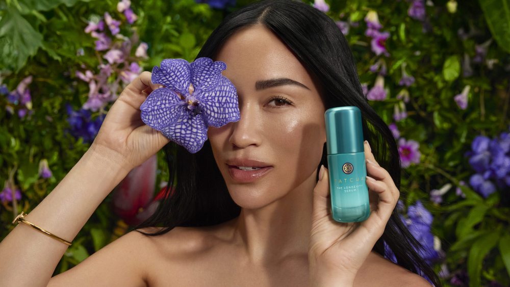 Stephanie Suganami holding Tatcha's new Longevity Serum