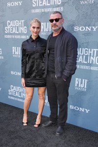 Taylor Neisen, Liev Schreiber at the Columbia Pictures "Caught Stealing" New York Premiere held at Regal Union Square on August 26, 2025 in New York, New York.