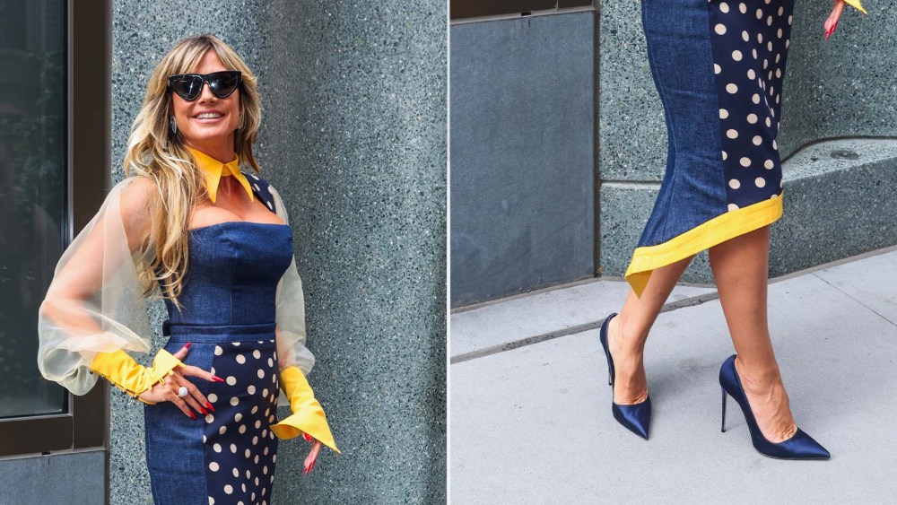 Heidi Klum wearing navy satin stiletto shoes while arrivingg to 'Good Morning America' in New York City on Wednesday.