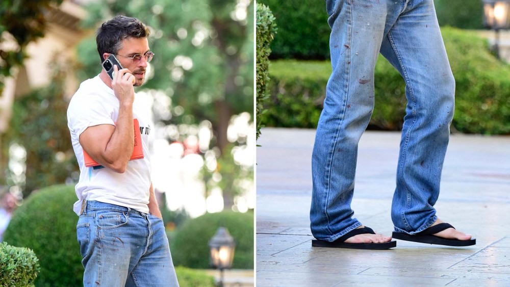 Jonathan Bailey wearing The Row's $690 Dune flip-flops while out. inLos Angeles on Wednesday.