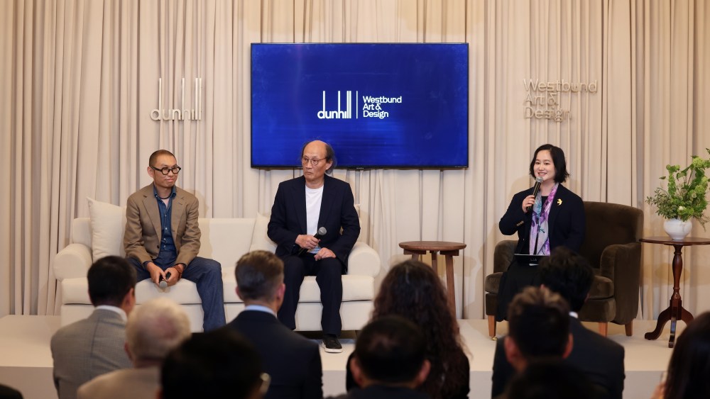 Chinese artist Qiu Anxiong, novelist Jin Yucheng, and curator Shen Qilan at Dunhill's announcement talk.