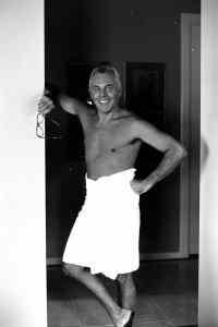 Giorgio Armani posing in a towel in 1981