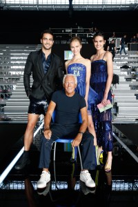 Giorgio Armani with looks from his Spring 2019 preview.
