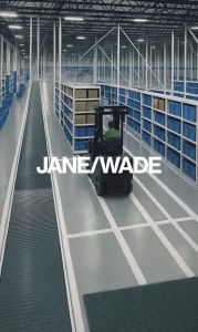 "’The Fulfillment’ descends to the ground floor of Jane Wade Inc., shifting focus from the executive suite to the warehouse floor." — Jane Wade