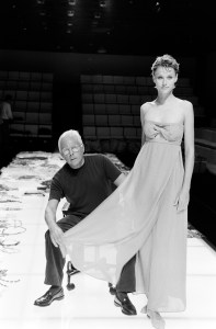 Designer Giorgio Armani with model during rehearsal for Giorgio Armani Spring 1994 Ready-to-Wear collection