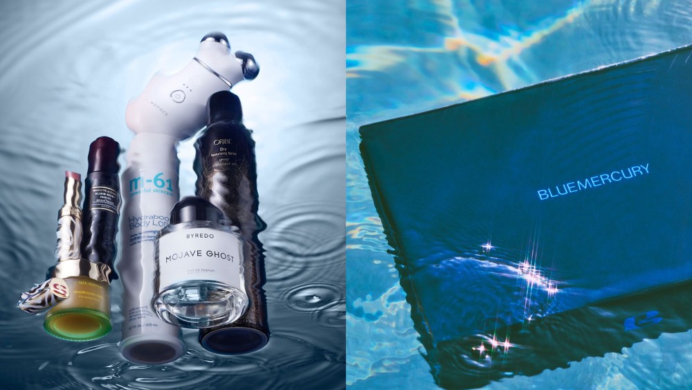 assortment of beauty products found at blue mercury, submerged in water; a bluemercury rectangular box also submerged in what looks like a pool