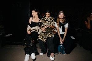 Marlo Kelly, Benee, and girl in red at the Coach Spring 2026 Ready-to-Wear show