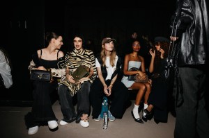 Marlo Kelly, Benee, girl in red, and Joyce Cisse at the Coach Spring 2026 Ready-to-Wear show