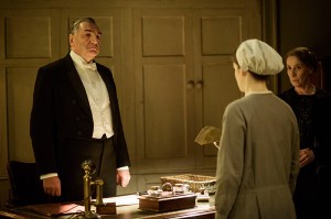 DOWNTON ABBEY, (from left): Jim Carter, Sophie McShera (back to camera), Phyllis Logan, (Season 6, ep. 601, originally aired in UK on Sept. 20, 2015 / airs in US on Jan. 3, 2016). photo: Nick Briggs / © Carnival Films for Masterpiece/PBS / Courtesy: Everett Collection