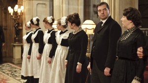 DOWNTON ABBEY, Siobhan Finneran (3rd from right, head turned), Brendan Coyle (2nd from right), Phyllis Logan (right), 2010-2015. photo: ©Carnival Films for Masterpiece/PBS / Courtesy: Everett Collection