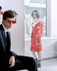Erika: Prada metal sunglasses; Miu Miu wool jacket and skirt, satin bra, embroidery socks and shoes.Addison: Alaïa recycled acetate sunglasses; Gucci wool jacket; Emporio Armani cotton shirt and wool pants; Brooks Brothers tie; Ralph Lauren Purple Label shoes.Brunson: Tory Burch acetate and metal sunglasses; Emporio Armani wool jacket; Gucci cotton shirt; Ralph Lauren Purple Label pants; Giorgio Armani velvet tie; Scarosso shoes.