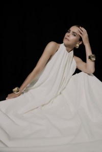Givenchy by Sarah Burton leather dress, boots, crystal earrings and bracelets.