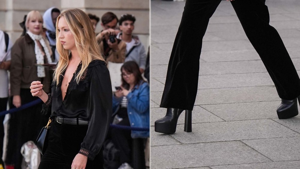 Lila Moss wearing towering platform black boots during Paris Fashion Week on Monday.