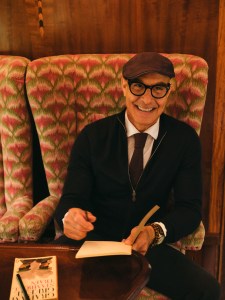 Stanley Tucci in the campaign for N. Peal’s new Art of Travelling collection.