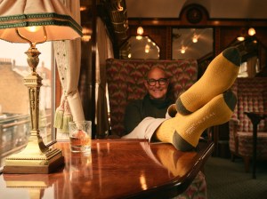 Stanley Tucci in the campaign for N. Peal’s new Art of Travelling collection.