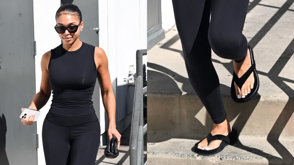 On Tuesday, Lori Harvey was spotted wearing black leather flip-flops after a pilates class with Laura Harrier.