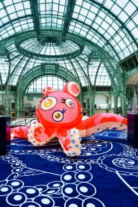 The Louis Vuitton stand at Art Basel Paris featuring artworks and handbag designs by Takashi Murakami.