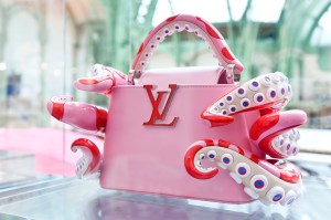 The Louis Vuitton stand at Art Basel Paris featuring artworks and handbag designs by Takashi Murakami.