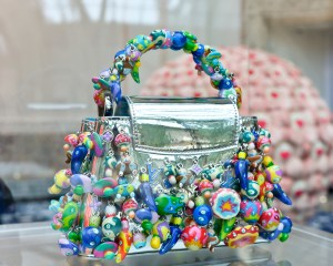 The Louis Vuitton stand at Art Basel Paris featuring artworks and handbag designs by Takashi Murakami.