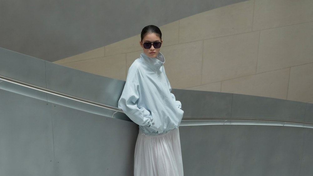 A model in a look from Sandro's Spring 2026 collection at the Bibliotheque Nationale in Paris.