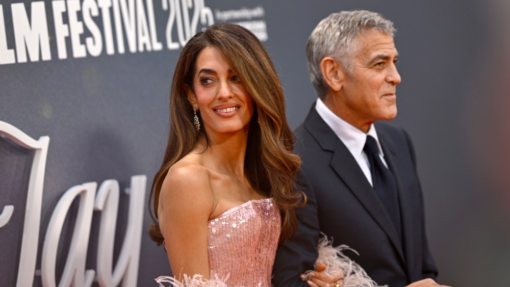 Amal Clooney wears a shimmering pink Tamara Ralph dress at the Jay Kelly screening at the 69th BFI London Film Festival on Oct. 10, 2025 in London.