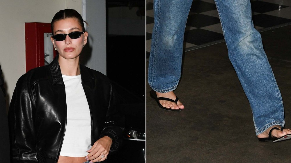 Hailey Bieber wearing The Row's City Sandal, an $890 flip-flop, while out in Los Angeles on Wednesday.