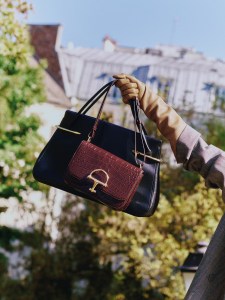 Givenchy by Sarah Burton leather Pinch bag (back); Gucci crocodile Siena bag (front); Dries Van Noten wool blazer; Thomasine lambskin gloves.