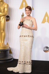 In Chanel at the 2015 Oscars.