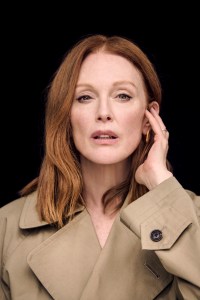 Balenciaga cotton maxi trenchcoat; Khaite boots; Bottega Veneta earrings; Jade Ruzzo Anna band in solid gold.