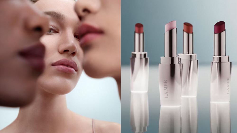 three models showing off the new la mer lip treatment on their lips; four shades of la mer's the lip treatment shown in their glossy tubes while standing upright