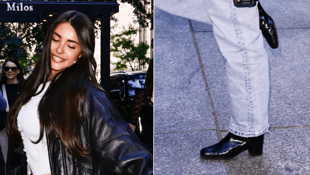 Madison Beer wears glossy black boots with jeans a day after the Victoria's Secret Fashion Show in New York City.