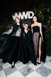 Coco Rocha, Christian Siriano and Daphne Velge at WWD115 Newsmaker Cocktail at Nine Orchard on October 27, 2025 in New York, New York.