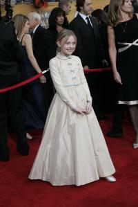 Dakota Fanning attends the 12th annual Screen Actors Guild Awards in Los Angeles at the Shrine Exposition Center.